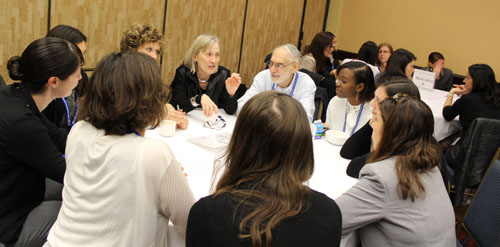 Claudia Goldin (Harvard, CSWEP Board 2001-04) and Robert Pollak (Washington University in St. Louis, CSWEP Board 2000-03) talk with junior economists about Research and Publishing at the  4th Annual Mentoring Breakfasts for Junior Economists